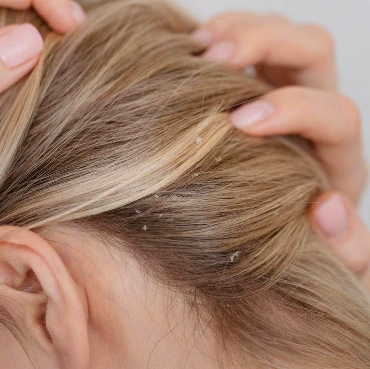 Hair porosity test with a glass of water.